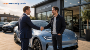 UK car dealer shaking hands with customer beside used car with digital warranty shield and dealer portal protection concept